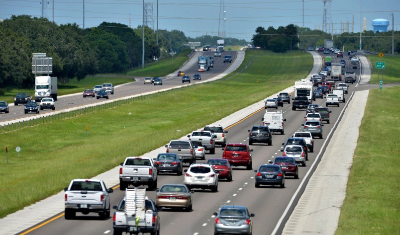 Northbound traffic, right, on I-75 through Sarasota, Florida is heavier than normal, but still moving on Thursday, Sept. 7, 2017.  Many South Florida residents are evacuating and heading north as Hurricane Irma approaches.  (AP Photo/mbr/Sarasota Herald-Tribune/Mike Lang) OUT CHARLOTTE SUN, OUT BRADENTON HERALD, MAGS OUT, TV OUT
