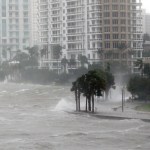 Waves crash over a seawall at the mouth of the Miami River from Biscayne Bay as Hurricane Irma passes by, Sunday, Sept. 10, 2017, in Miami. (AP Photo/Wilfredo Lee)