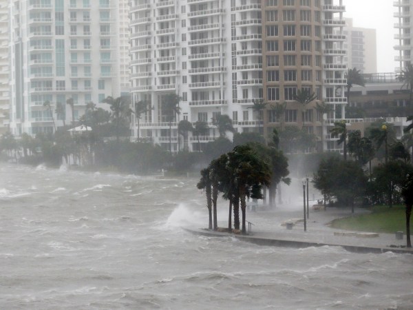 Waves crash over a seawall at the mouth of the Miami River from Biscayne Bay as Hurricane Irma passes by, Sunday, Sept. 10, 2017, in Miami. (AP Photo/Wilfredo Lee)