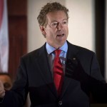 Senator Rand Paul, R-Ky., speaks to supporters gathered at The Champions of Liberty Rally in Hebron, Ky., Friday, August 11, 2017.  Sen Paul was joined at the fundraising event by Kentucky Gov. Matt Bevin, and U.S. Reps Thomas Massie, R-Ky., and Jim Jordan, R-Ohio. (AP Photo/Bryan Woolston)