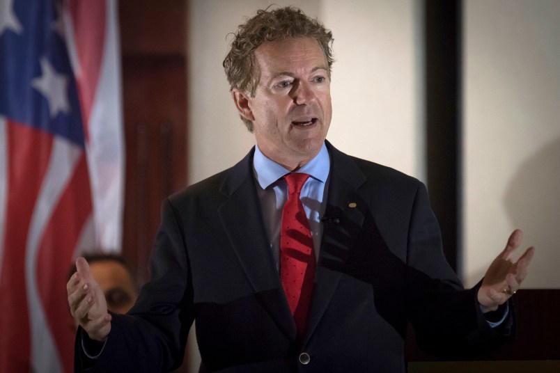 Senator Rand Paul, R-Ky., speaks to supporters gathered at The Champions of Liberty Rally in Hebron, Ky., Friday, August 11, 2017.  Sen Paul was joined at the fundraising event by Kentucky Gov. Matt Bevin, and U.S. Reps Thomas Massie, R-Ky., and Jim Jordan, R-Ohio. (AP Photo/Bryan Woolston)