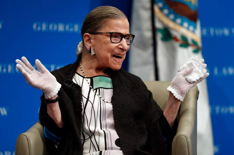 U.S. Supreme Court Justice Ruth Bader Ginsburg reacts to applause as she is introduced by William Treanor, Dean and Executive Vice President of Georgetown University Law Center, at the Georgetown University Law Center campus in Washington, Wednesday, Sept. 20, 2017. (AP Photo/Carolyn Kaster)