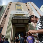 Ricardo Castellanos stablished communication thru his cellphone at a wifi hotspot located at Ponce de Leon avenue on the fourth day after the impact of Maria, a Category 5 hurricane that crossed the island, in San Juan, Puerto Rico, Sunday, September 24, 2017. Shortly after the passing of the hurricane all communications collapsed all over the US Territory. (AP Photo/Carlos Giusti)
