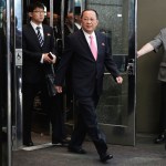 North Korea's Foreign Minister Ri Yong Ho, center, followed by his interpreter, left, walks to the microphones to speak outside the U.N. Plaza Hotel, in New York, Monday, Sept. 25, 2017. (AP Photo/Richard Drew)