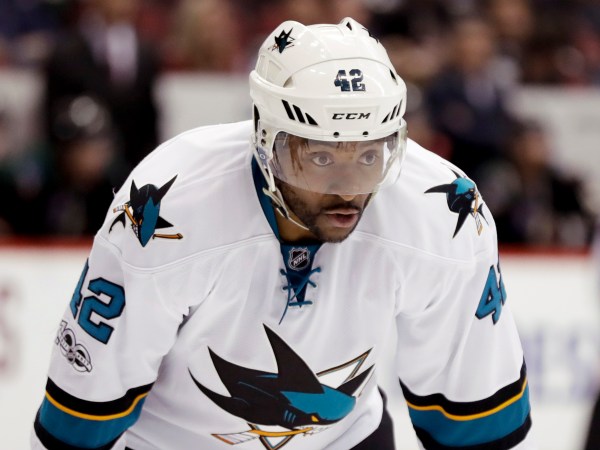 San Jose Sharks right wing Joel Ward lines up against the Arizona Coyotes during the third period of an NHL hockey game in Glendale, Ariz., Saturday, Feb. 18, 2017. (AP Photo/Chris Carlson)