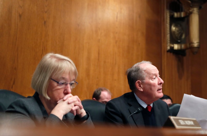 Senate Health, Education, Labor, and Pensions Committee Chairman Sen. Lamar Alexander, R-Tenn., accompanied by the committee's ranking member Sen. Patty Murray, D-Wash. speaks on Capitol Hill in Washington, Tuesday, Jan. 31, 2017, during the committee's executive session to discuss the nomination of Education Secretary Betsy DeVos.  (AP Photo/Alex Brandon)