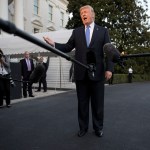 President Donald Trump talks to the media as he walks from Marine One to the White House in Washington, Wednesday, Sept. 27, 2017, as he returns from Indianapolis. (AP Photo/Carolyn Kaster)