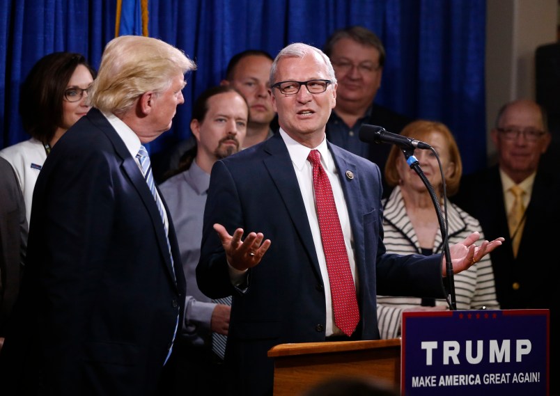 U.S. Rep., Kevin Cramer, R-ND, right, talks about being one of the first to endorse Republican presidential candidate Donald Trump, as Trump meets with some of the 22 delegates from North Dakota to the Republican National Convention, who are the core of delegates that elevated Trump over the 1237 needed for the GOP's presidential nomination, Thursday, May 26, 2016, in Bismarck, N.D. (AP Photo/Charles Rex Arbogast)