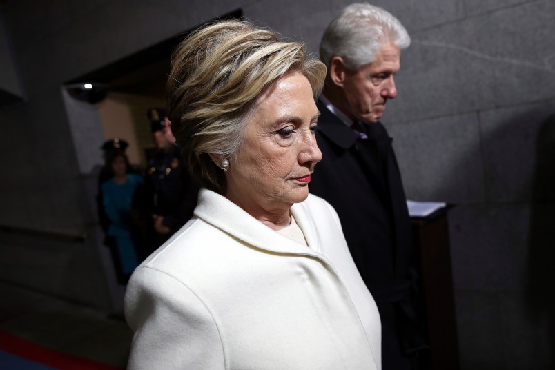 WASHINGTON, DC - JANUARY 20:  Former Democratic presidential nominee Hillary Clinton (L) and former President Bill Clinton arrive on the West Front of the U.S. Capitol on January 20, 2017 in Washington, DC. In today's inauguration ceremony Donald J. Trump becomes the 45th president of the United States.  (Photo by Win McNamee/Getty Images)