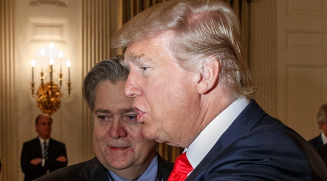 President Donald Trump talks with Cleveland Clinic President and CEO Toby Cosgrove during a meeting with business leaders in the State Dining Room of the White House in Washington, Friday, Feb. 3, 2017, in Washington. From left are, Cosgrove, White House chief strategist Steve Bannon, Trump, and Tesla and SpaceX CEO Elon Musk. (AP Photo/Evan Vucci)