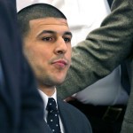 FILE - In this April 15, 2015, file photo, former New England Patriots football player Aaron Hernandez listens as the verdict is read finding him guilty in the shooting death of Odin Lloyd, at the Bristol County Superior Court in Fall River, Mass. In court documents filed Monday, May 1, 2017, prosecutors asked a judge to reject a request by attorneys for Hernandez to dismiss his murder conviction because he died before having his appeal heard. Hernandez was found hanged in his prison cell on April 19, 2017.  (Dominick Reuter/Pool Photo via AP, File)