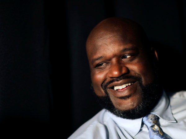 Former NBA basketball player Shaquille O'Neal sits off-set on a break from taping a commercial in Atlanta, Tuesday, April 18, 2017. (AP Photo/David Goldman)