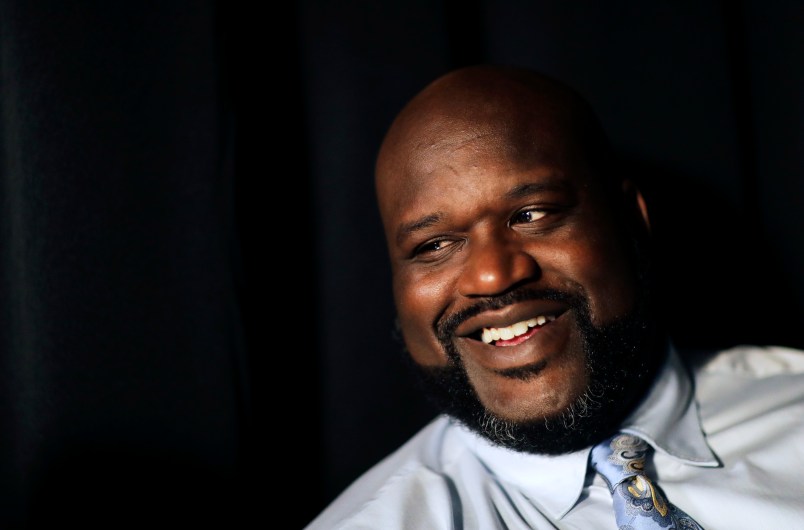 Former NBA basketball player Shaquille O'Neal sits off-set on a break from taping a commercial in Atlanta, Tuesday, April 18, 2017. (AP Photo/David Goldman)