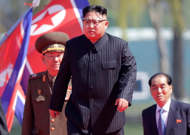 North Korean leader Kim Jong Un, second right, is accompanied by Pak Pong Ju, right, Hwang Pyong So, second left, and Choe Ryong Hae, left, as he arrives for the official opening of the Ryomyong residential area, a collection of more than a dozen apartment buildings, on Thursday, April 13, 2017, in Pyongyang, North Korea. (AP Photo/Wong Maye-E)
