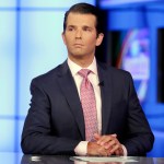 Donald Trump Jr. is interviewed by host Sean Hannity on his Fox News Channel television program, in New York Tuesday, July 11, 2017. Donald Trump Jr. eagerly accepted help from what was described to him as a Russian government effort to aid his father's campaign with damaging information about Hillary Clinton, according to emails he released publicly on Tuesday. (AP Photo/Richard Drew)