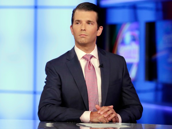 Donald Trump Jr. is interviewed by host Sean Hannity on his Fox News Channel television program, in New York Tuesday, July 11, 2017. Donald Trump Jr. eagerly accepted help from what was described to him as a Russian government effort to aid his father's campaign with damaging information about Hillary Clinton, according to emails he released publicly on Tuesday. (AP Photo/Richard Drew)