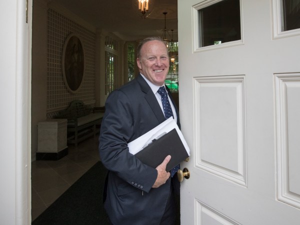 Sean Spicer, President Donald Trump's oft-beleaguered press secretary, stands in the doorway to the Palm Room at the White House in Washington during renovations to the West Wing, Friday, Aug. 11, 2017.   (AP Photo/J. Scott Applewhite)