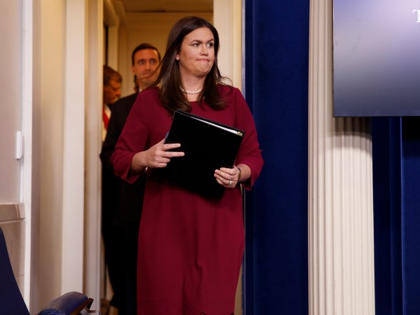 White House press secretary Sarah Huckabee Sanders arrives for the daily press briefing, Thursday, Aug. 31, 2017, in Washington. (AP Photo/Evan Vucci)