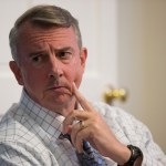 Republican Gubernatorial candidate Ed Gillespie talks with a group of recovering addicts at the Recovery House in Richmond, Va., Wednesday, Aug. 30, 2017.  Gillespie a polished Washington insider, has long advocated that eh GOP needs to be more welcoming of minorities and immigrants.  (AP Photo/Steve Helber)