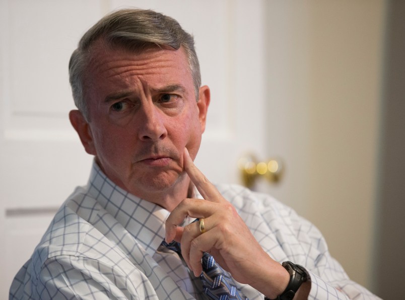 Republican Gubernatorial candidate Ed Gillespie talks with a group of recovering addicts at the Recovery House in Richmond, Va., Wednesday, Aug. 30, 2017.  Gillespie a polished Washington insider, has long advocated that eh GOP needs to be more welcoming of minorities and immigrants.  (AP Photo/Steve Helber)