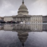 The Capitol is seen during a heavy rain as lawmakers begin their August recess, in Washington, Friday, July 28, 2017.  (AP Photo/J. Scott Applewhite)