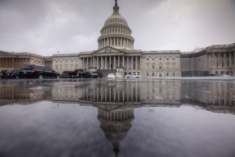 The Capitol is seen during a heavy rain as lawmakers begin their August recess, in Washington, Friday, July 28, 2017.  (AP Photo/J. Scott Applewhite)