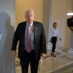 Sen. John McCain, R-Ariz., walks from his Senate office as Congress returns from the August recess to face work on immigration, the debt limit, funding the government, and help for victims of Hurricane Harvey, in Washington, Tuesday, Sept. 5, 2017.  Earlier, McCain declared President Donald Trump’s decision to phase out an Obama administration program that has protected hundreds of thousands of young immigrants “the wrong approach” at a time when Republicans and Democrats need to work together.  (AP Photo/J. Scott Applewhite)