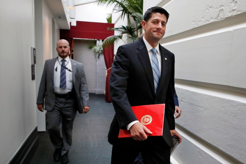House Speaker Paul Ryan of Wisconsin, right, arrives for a meeting with House Republicans, Wednesday, Sept. 6, 2017, on Capitol Hill in Washington. (AP Photo/Jacquelyn Martin)