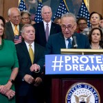 Senate Minority Leader Chuck Schumer of N.Y., accompanied by House Minority Leader Nancy Pelosi of Calif., left, and others members of the House and Senate Democrats, speaks during a news conference on Capitol Hill in Washington, Wednesday, Sept. 6, 2017. House and Senate Democrats gather to call for Congressional Republicans to stand up to President Trump's decision to terminate the Deferred Action for Childhood Arrivals (DACA) initiative by bringing the DREAM Act for a vote on the House and Senate Floor. ( AP Photo/Jose Luis Magana)