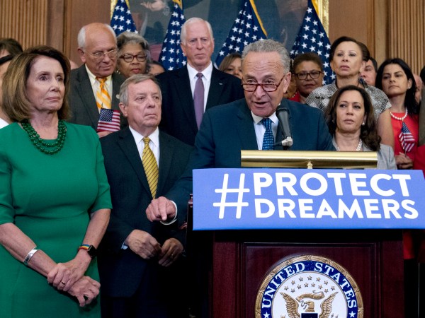 Senate Minority Leader Chuck Schumer of N.Y., accompanied by House Minority Leader Nancy Pelosi of Calif., left, and others members of the House and Senate Democrats, speaks during a news conference on Capitol Hill in Washington, Wednesday, Sept. 6, 2017. House and Senate Democrats gather to call for Congressional Republicans to stand up to President Trump's decision to terminate the Deferred Action for Childhood Arrivals (DACA) initiative by bringing the DREAM Act for a vote on the House and Senate Floor. ( AP Photo/Jose Luis Magana)