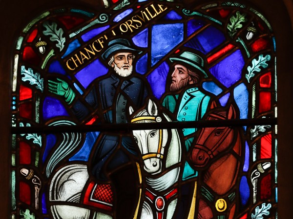 A detail of stained glass windows depicting two iconic Confederate generals that are being removed is seen at the Washington National Cathedral in Washington, Wednesday, Sept. 6, 2017. Cathedral authorities announced Wednesday that windows depicting generals Robert E. Lee and Thomas "Stonewall" Jackson will be removed and stored pending a decision about their future. (AP Photo/Carolyn Kaster)