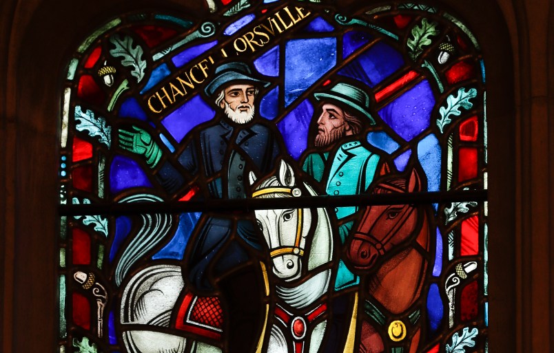 A detail of stained glass windows depicting two iconic Confederate generals that are being removed is seen at the Washington National Cathedral in Washington, Wednesday, Sept. 6, 2017. Cathedral authorities announced Wednesday that windows depicting generals Robert E. Lee and Thomas "Stonewall" Jackson will be removed and stored pending a decision about their future. (AP Photo/Carolyn Kaster)