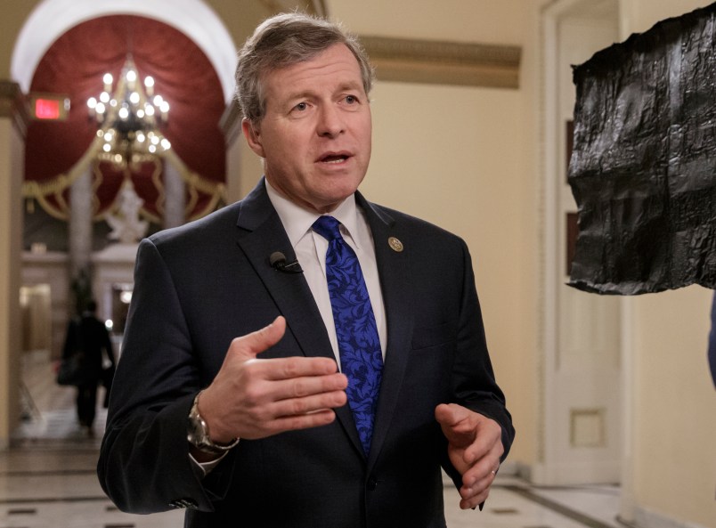 Rep. Charlie Dent, R-Pa., a key moderate in the health care bill debate, explains why he would be voting "no" on the Obamacare replacement, Thursday, March 23, 2017, on Capitol Hill in Washington. House Speaker Paul Ryan and the Republican leadership are scrambling for votes on their health care overhaul in the face of opposition from reluctant conservatives in the House Freedom Caucus, such as Rep. Ted Yoho, R-Fla., being interviewed at right. (AP Photo/J. Scott Applewhite)