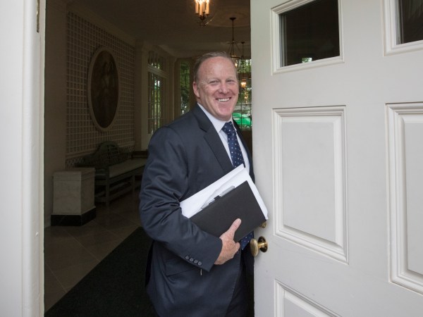 Sean Spicer, President Donald Trump's oft-beleaguered press secretary, stands in the doorway to the Palm Room at the White House in Washington during renovations to the West Wing, Friday, Aug. 11, 2017.   (AP Photo/J. Scott Applewhite)