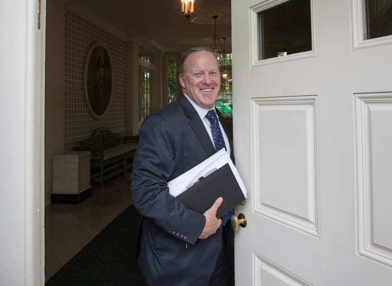 Sean Spicer, President Donald Trump's oft-beleaguered press secretary, stands in the doorway to the Palm Room at the White House in Washington during renovations to the West Wing, Friday, Aug. 11, 2017.   (AP Photo/J. Scott Applewhite)