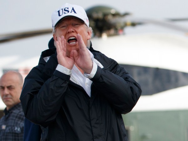 President Donald Trump and first lady Melania Trump walk to board Air Force One for a trip to Florida to meet with first responders and people impacted by Hurricane Irma, Thursday, Sept. 14, 2017, in Andrews Air Force Base, Md. (AP Photo/Evan Vucci)