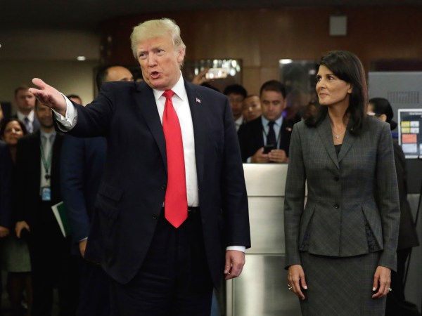 President Donald Trump, accompanied by U.S. Ambassador Nikki Haley arrives at the United Nations, Monday, Sept. 18, 2017. (AP Photo/Richard Drew)