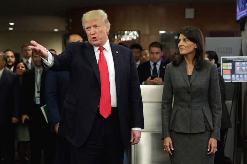 President Donald Trump, accompanied by U.S. Ambassador Nikki Haley arrives at the United Nations, Monday, Sept. 18, 2017. (AP Photo/Richard Drew)