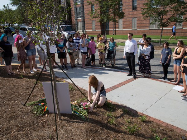 A small group of people gather at a memorial for Georgia Tech student Scout Schultz Sunday, September 17, 2017, In Atlanta GA. Schultz, an engineering student at Georgia Tech, was shot by Georgia Tech campus police near Curran Parking Deck after allegedly wielding a knife and telling officers to shoot him Saturday night. STEVE SCHAEFER / SPECIAL TO THE AJC