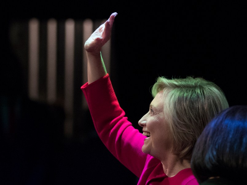 Hillary Clinton waves to the audience as she at the Warner Theatre in Washington, Monday, Sept. 18, 2017, for book tour event for her new book "What Happened" hosted by the Politics and Prose Bookstore. (AP Photo/Carolyn Kaster)