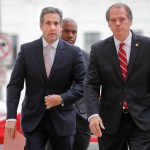 Michael Cohen, left, President Donald Trump's personal attorney, arrives on Capitol Hill in Washington, Tuesday, Sept. 19, 2017. Cohen is schedule to testify before the Senate Intelligence Committee in a closed session. (AP Photo/Pablo Martinez Monsivais)