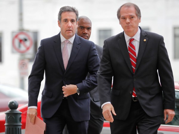 Michael Cohen, left, President Donald Trump's personal attorney, arrives on Capitol Hill in Washington, Tuesday, Sept. 19, 2017. Cohen is schedule to testify before the Senate Intelligence Committee in a closed session. (AP Photo/Pablo Martinez Monsivais)