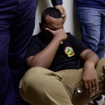 Feelings of frustration surround the members of the rescue team from the municipality of Humacao, desperate to go out to attend several calls for help from citizens in need of assistance during the impact of Maria, a Category 5 hurricane that started to hit the eastern region of the island, in Humacao, Puerto Rico, Tuesday, September 20, 2017. At that point, Maria downgraded to a category 4 hurricane. (AP Photo/Carlos Giusti)