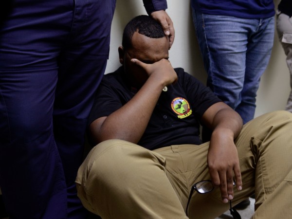 Feelings of frustration surround the members of the rescue team from the municipality of Humacao, desperate to go out to attend several calls for help from citizens in need of assistance during the impact of Maria, a Category 5 hurricane that started to hit the eastern region of the island, in Humacao, Puerto Rico, Tuesday, September 20, 2017. At that point, Maria downgraded to a category 4 hurricane. (AP Photo/Carlos Giusti)