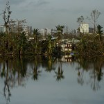 A view of Buena Vista community  from the Teodoro Moscoso bridge on the fourth day after the impact of Maria, a Category 5 hurricane that crossed the island, in San Juan, Puerto Rico, Sunday, September 24, 2017. Shortly after the passing of the hurricane all communications collapsed all over the US Territory. (AP Photo/Carlos Giusti)