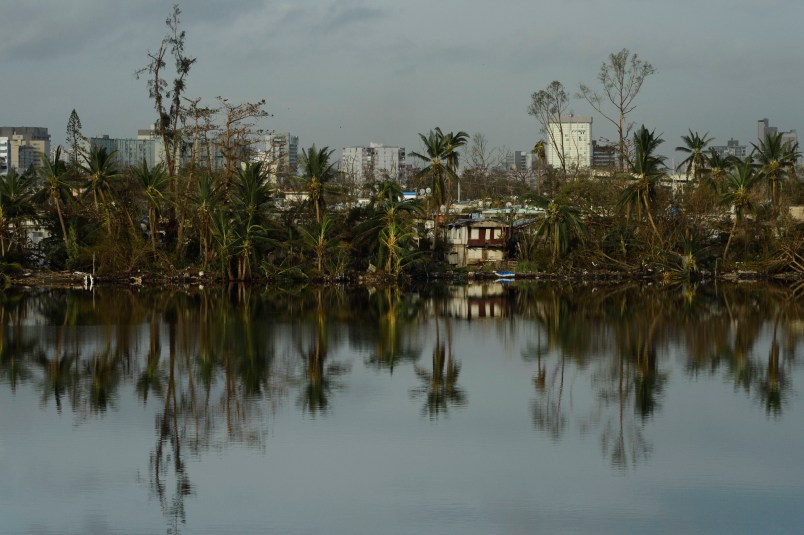 A view of Buena Vista community  from the Teodoro Moscoso bridge on the fourth day after the impact of Maria, a Category 5 hurricane that crossed the island, in San Juan, Puerto Rico, Sunday, September 24, 2017. Shortly after the passing of the hurricane all communications collapsed all over the US Territory. (AP Photo/Carlos Giusti)