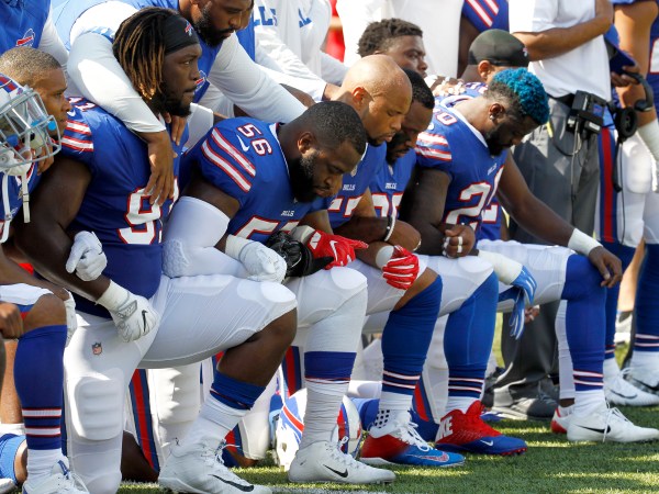 Buffalo Bills players kneel during the national anthem prior to an NFL football game against the Denver Broncos, Sunday, Sept. 24, 2017, in Orchard Park, N.Y. (AP Photo/Jeffrey T. Barnes)