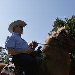 Former Alabama Chief Justice and U.S. Senate candidate Roy Moore, rides in on a horse to vote a the Gallant Volunteer Fire Department, during the Alabama Senate race, Tuesday, Sept. 26, 2017, in Gallant, Ala. (AP Photo/Brynn Anderson)