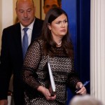 White House press secretary Sarah Huckabee Sanders and White House chief economic adviser Gary Cohn arrive for the daily press briefing, Thursday, Sept. 28, 2017, in Washington. (AP Photo/Evan Vucci)
