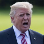 President Donald Trump talks to media as he walks across the South Lawn of the White House in Washington, Friday, Sept. 29, 2017, to Marine One for the short trip to Andrews Air Force Base en route to Bedminster, N.J.. (AP Photo/Carolyn Kaster)